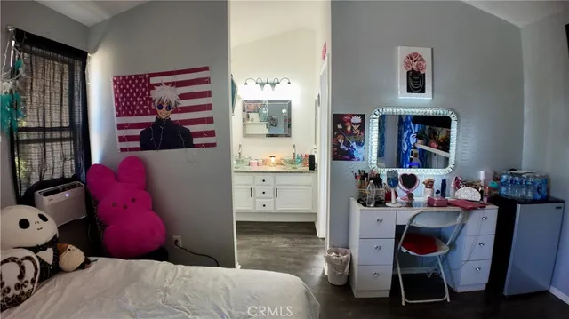 a bathroom with a sink double vanity and a mirror