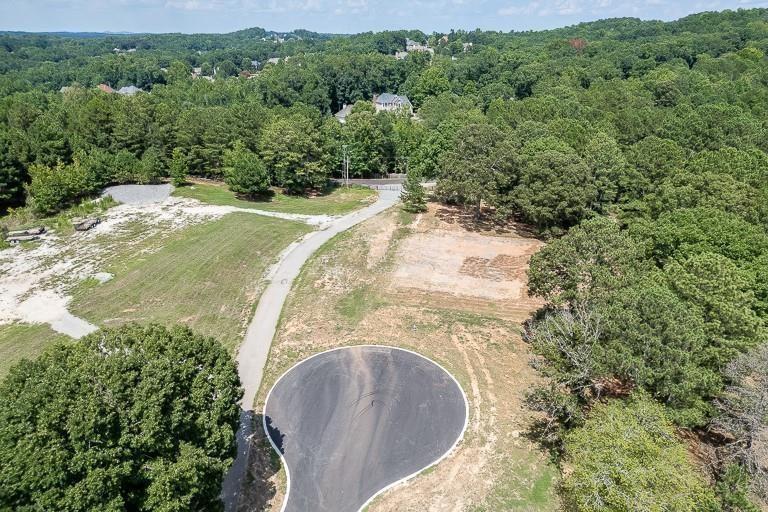 5775 Kennedy Road Suwanee, GA 30024 - Photo 15 of 23 an aerial view of a house with a yard