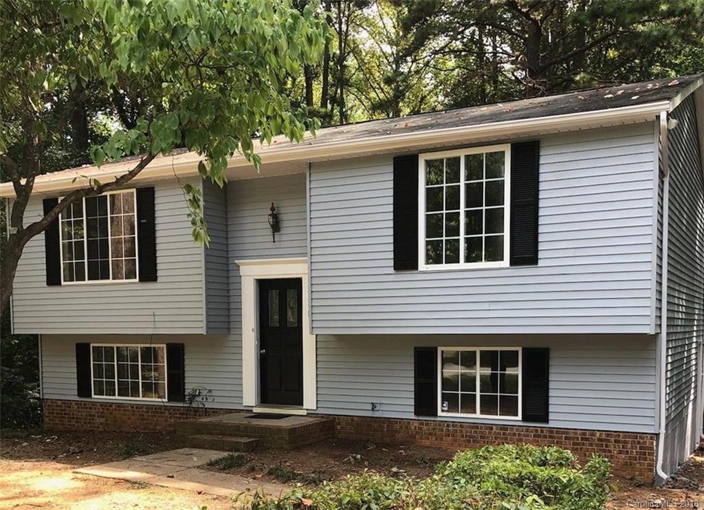 a house that has a window in front of it