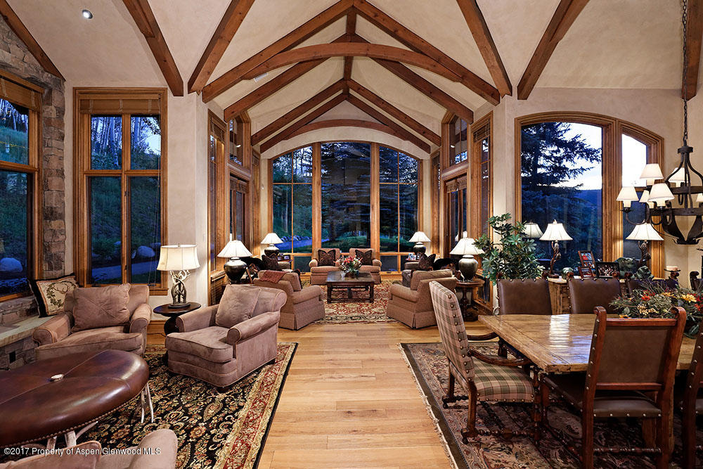 80 Spruce Ridge Lane Snowmass Village, CO 81615 - Photo 12 of 40 a living room with furniture and a large window