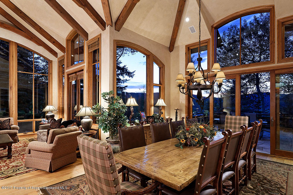 80 Spruce Ridge Lane Snowmass Village, CO 81615 - Photo 14 of 40 a view of a dining room with furniture window and outdoor kitchen