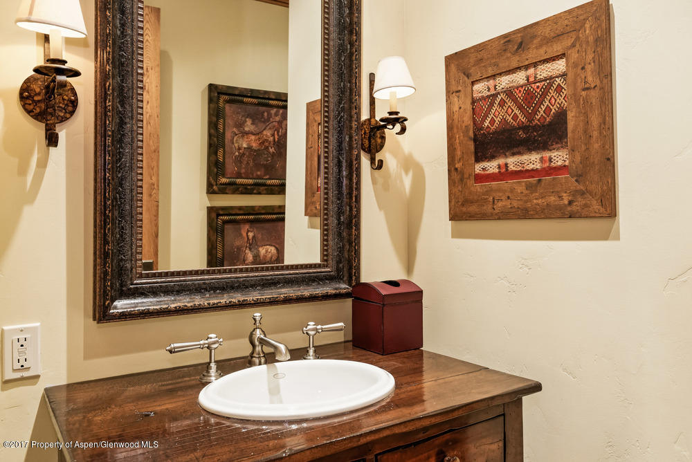 80 Spruce Ridge Lane Snowmass Village, CO 81615 - Photo 37 of 40 a bathroom with a sink and a mirror