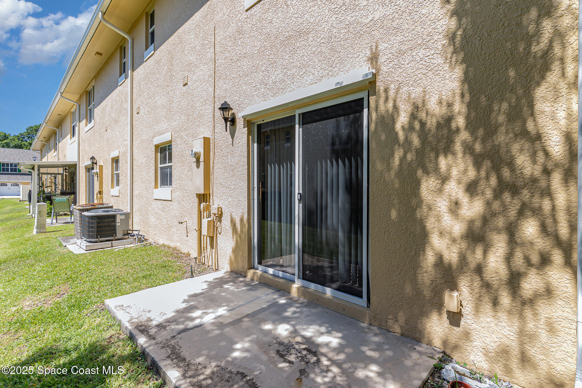 609 Cedar Side Circle Northeast Palm Bay, FL 32905 - Photo 16 of 19 a view of a house with backyard