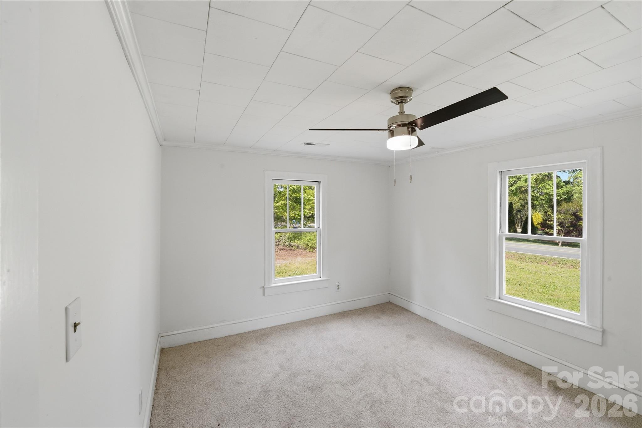 2231 Claremont Road Newton, NC 28658 - Photo 10 of 39 an empty room with windows