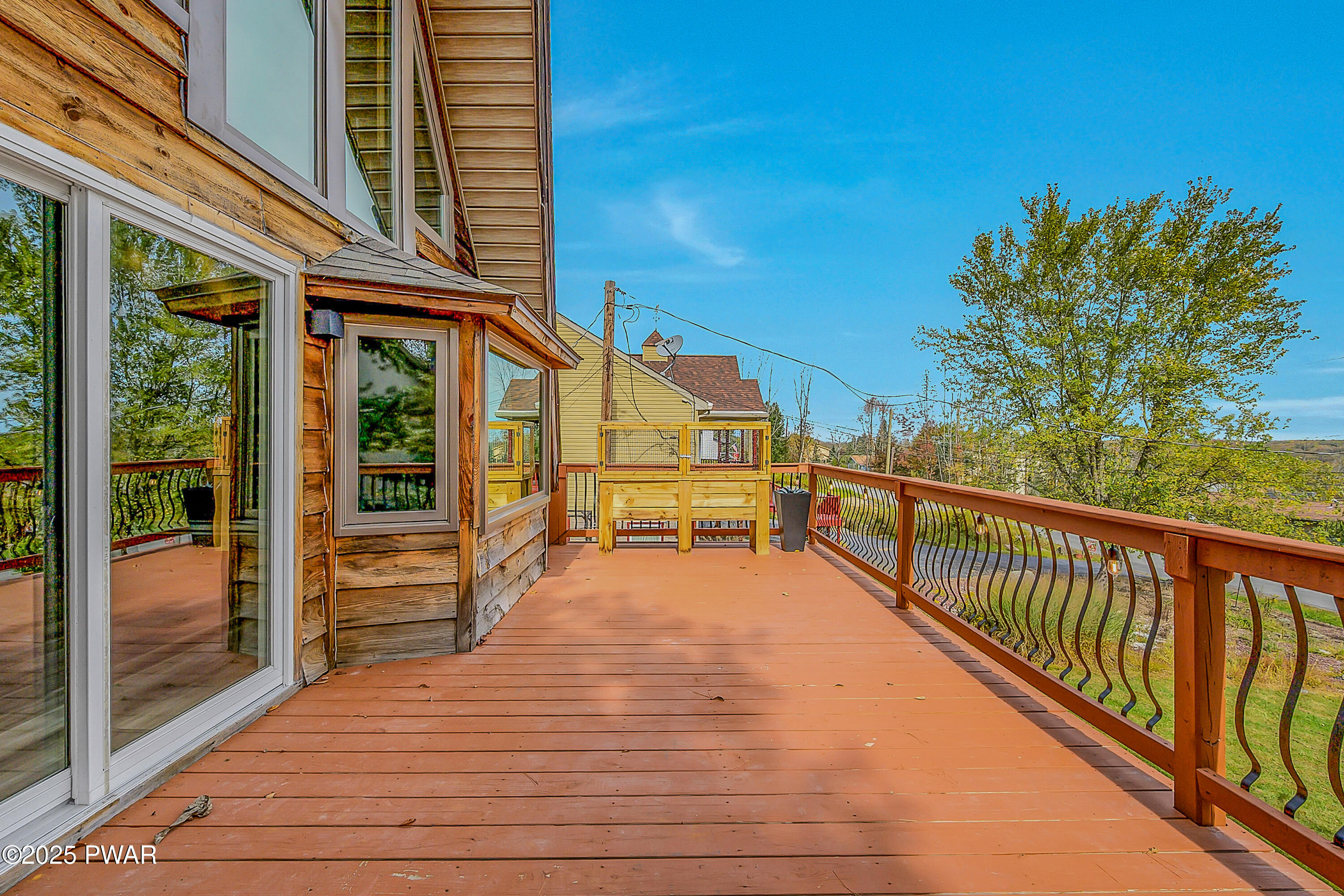 100 Ridgeview Drive Lake Ariel, PA 18436 - Photo 2 of 52 a view of a balcony with wooden floor and outdoor space