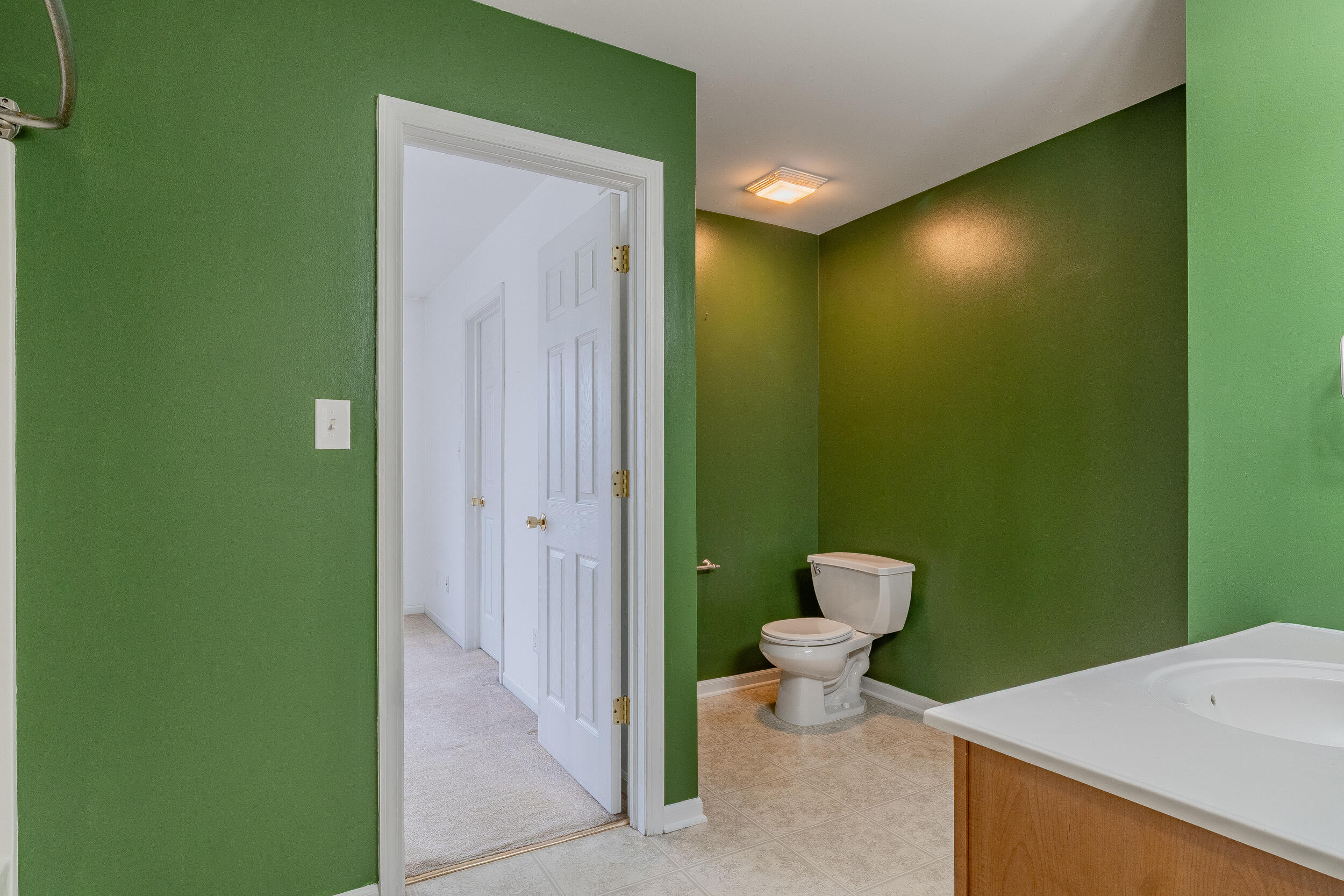 11742 Broadway Crown Point, IN 46307 - Photo 21 of 41 a bathroom with a toilet and a sink