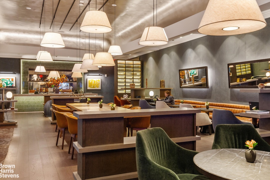 111 West 56th Street, Unit 38L Manhattan, NY 10019 - Photo 10 of 12 a kitchen with lots of counter top space