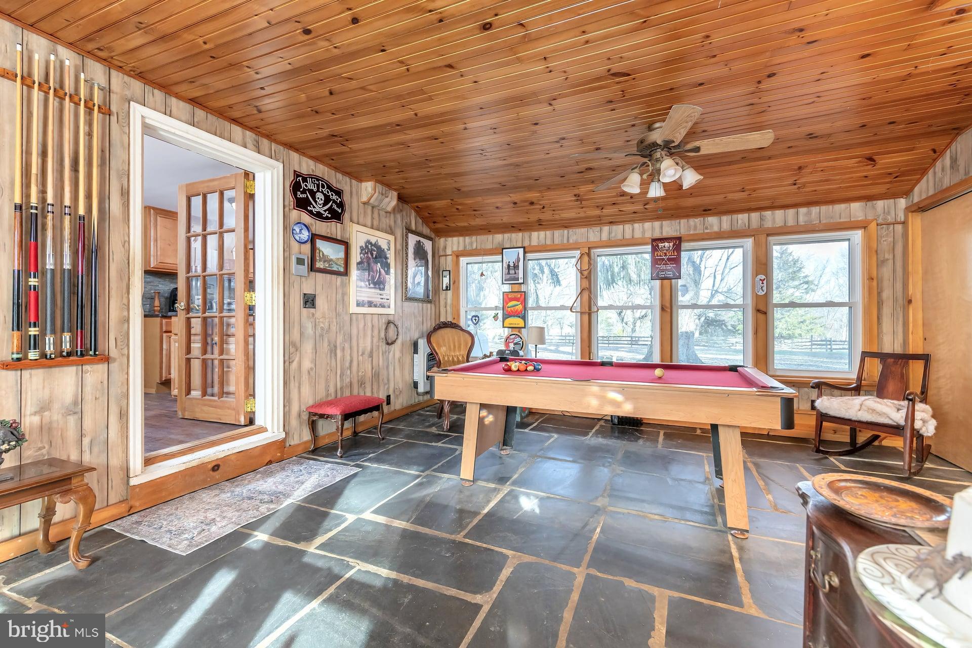 41 Hackett Road Woodstown, NJ 08098 - Photo 12 of 67 a outdoor space with the couches and dining table with the view of bathroom