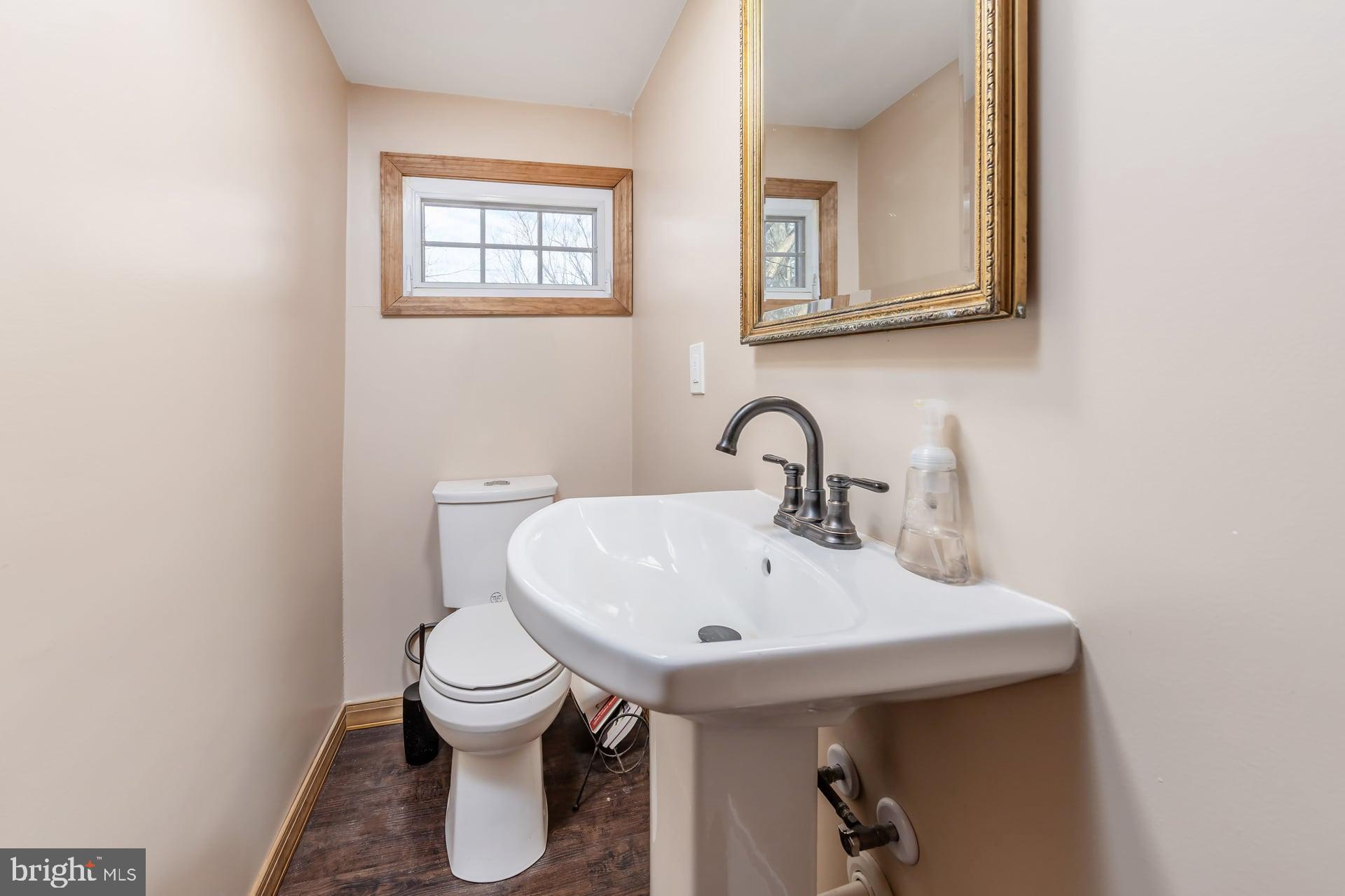 41 Hackett Road Woodstown, NJ 08098 - Photo 13 of 67 a bathroom with a toilet and a sink
