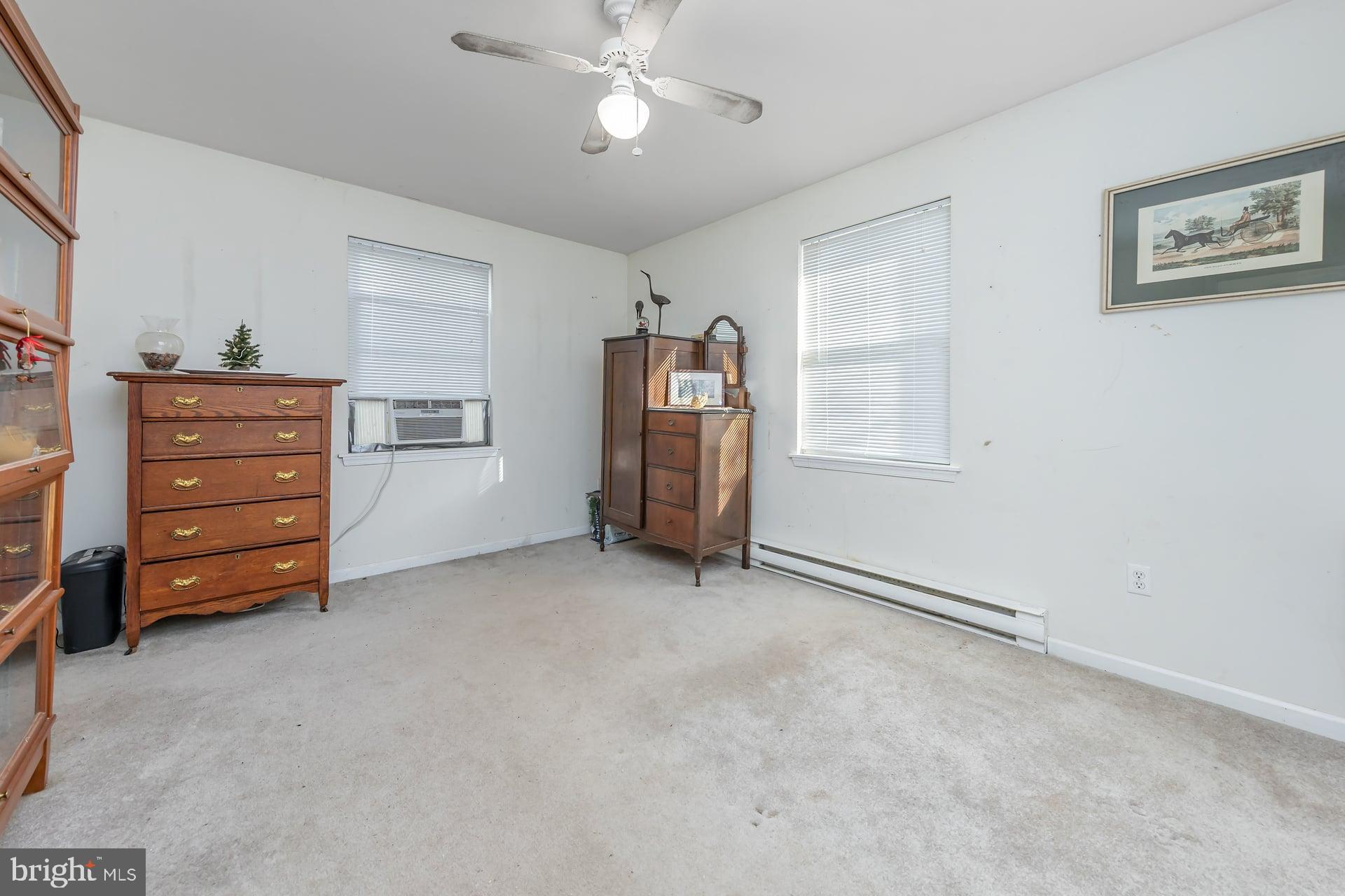 41 Hackett Road Woodstown, NJ 08098 - Photo 24 of 67 a view of an empty room with window and cabinet