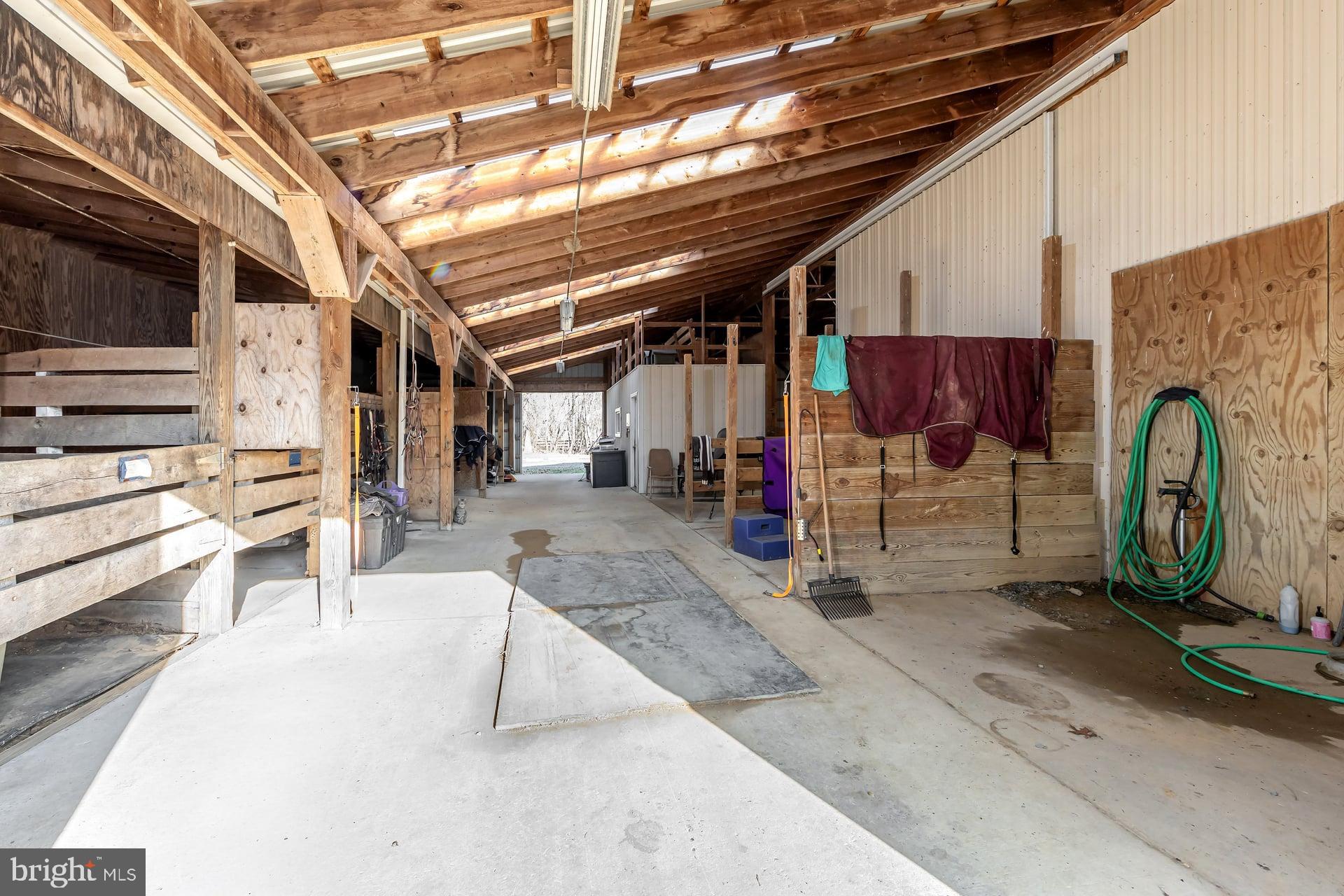 41 Hackett Road Woodstown, NJ 08098 - Photo 33 of 67 a view of a garage with wooden deck