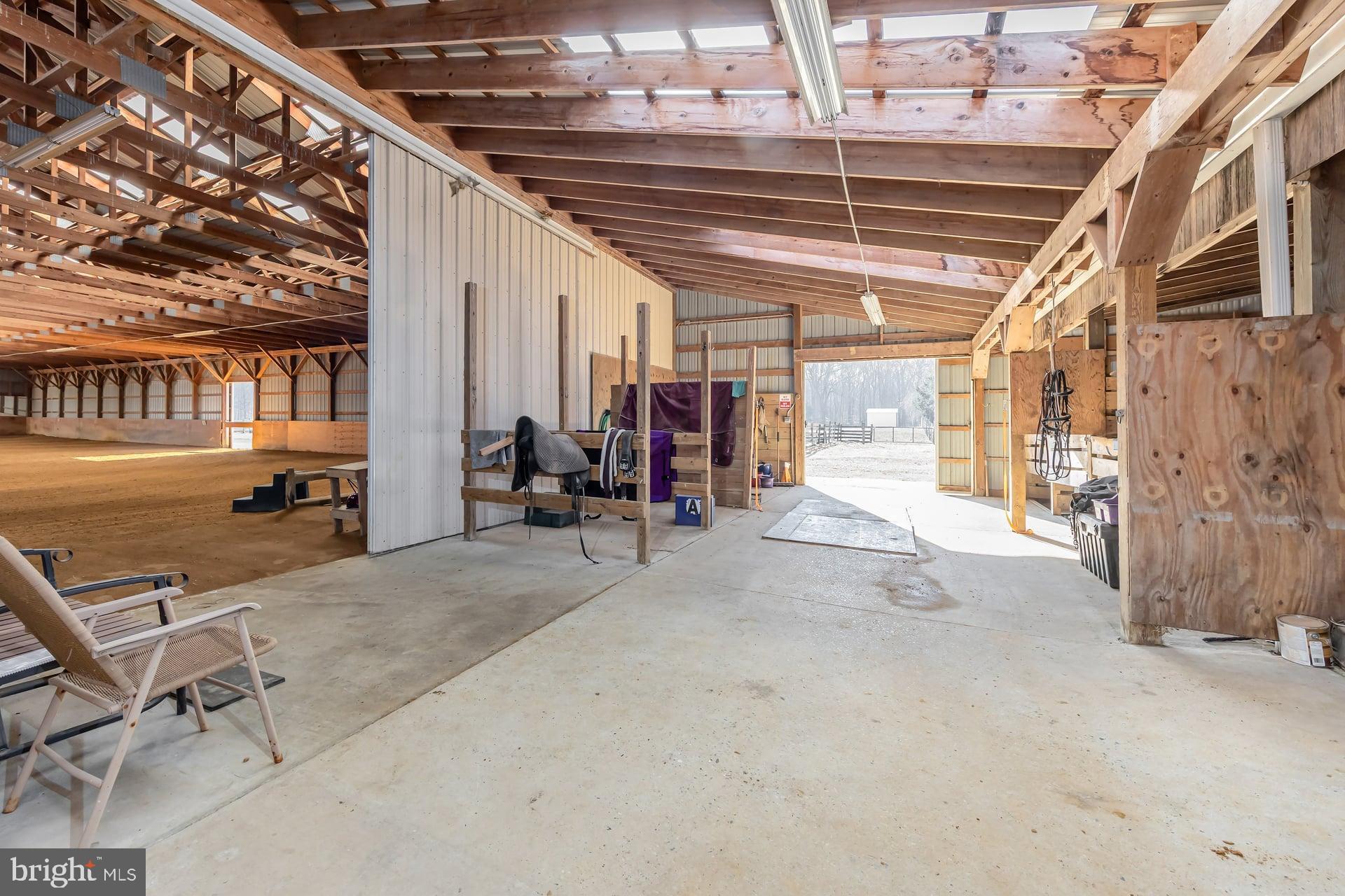 41 Hackett Road Woodstown, NJ 08098 - Photo 34 of 67 a view of a porch with furniture and a garage