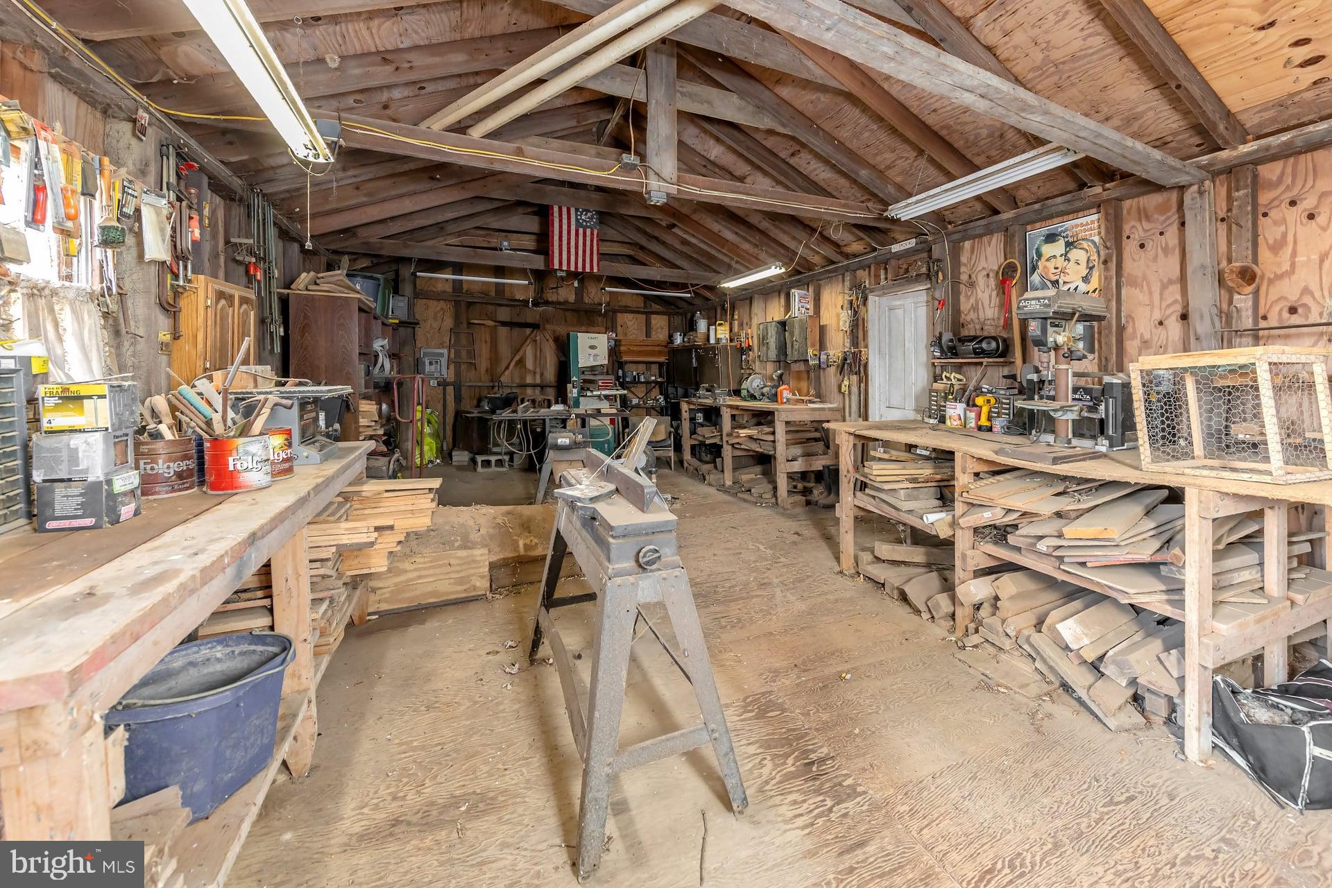 41 Hackett Road Woodstown, NJ 08098 - Photo 41 of 67 a view of a patio with table and chairs