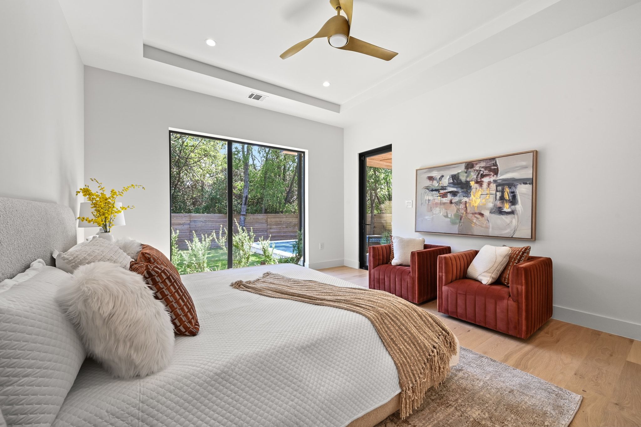 1503 Barn Swallow Drive Austin, TX 78746 - Photo 15 of 40 a bedroom with a bed and a couch