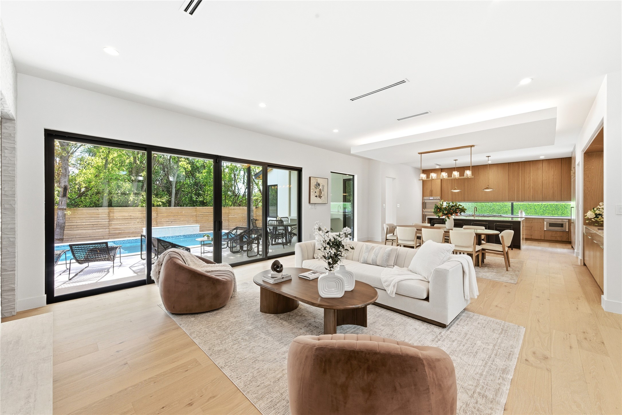 1503 Barn Swallow Drive Austin, TX 78746 - Photo 2 of 40 a living room with furniture and a large window