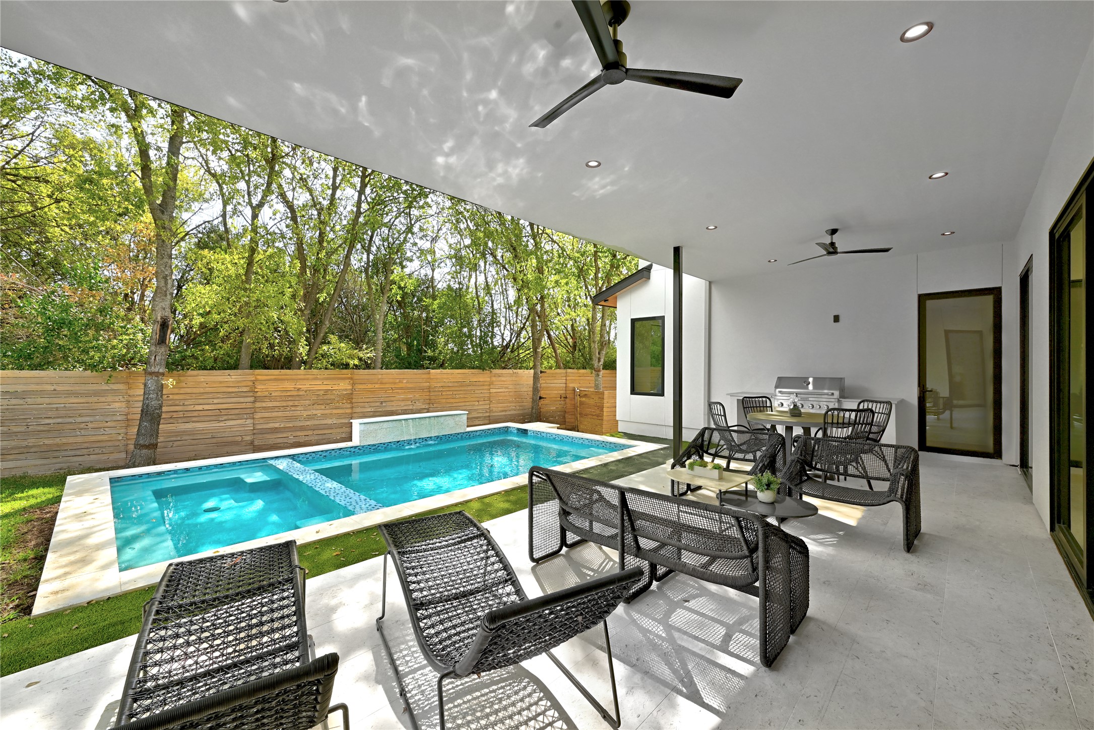 1503 Barn Swallow Drive Austin, TX 78746 - Photo 38 of 40 a living room with patio area
