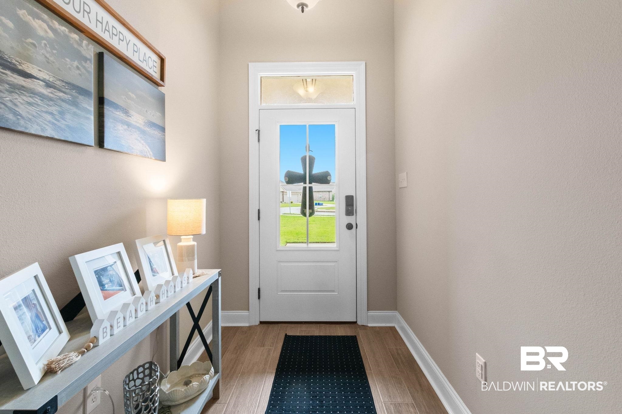 22244 Hibiscus Circle Foley, AL 36535 - Photo 12 of 51 Entryway featuring a white paneled door with a clear glass insert and transom window