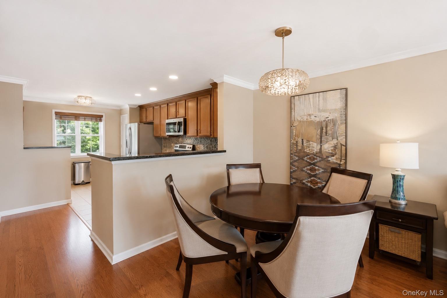 323 Waterside Close Peekskill, NY 10566 - Photo 7 of 42 Dining area with decorative chandelier
