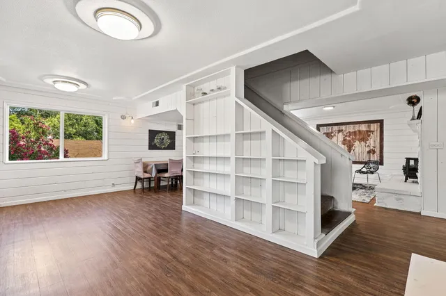 a view of livingroom with furniture and wooden floor