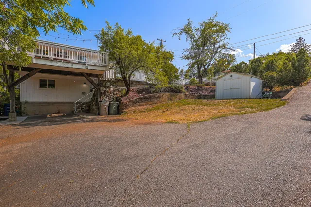 a view of garage and yard