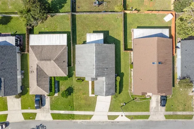 aerial view of a house with a swimming pool