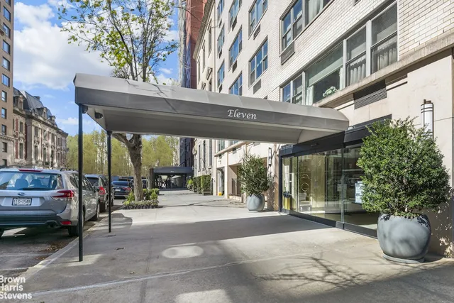 a view of a building with sitting area