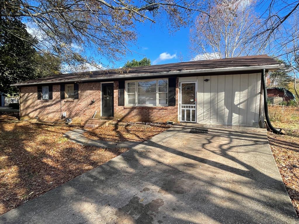 1135 Casteel Road Powder Springs, GA 30127 - Photo 1 of 45 a view of a house with a yard