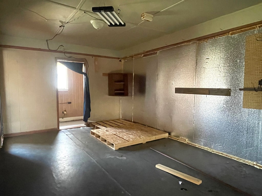 1135 Casteel Road Powder Springs, GA 30127 - Photo 13 of 45 a view of a room with gym equipment