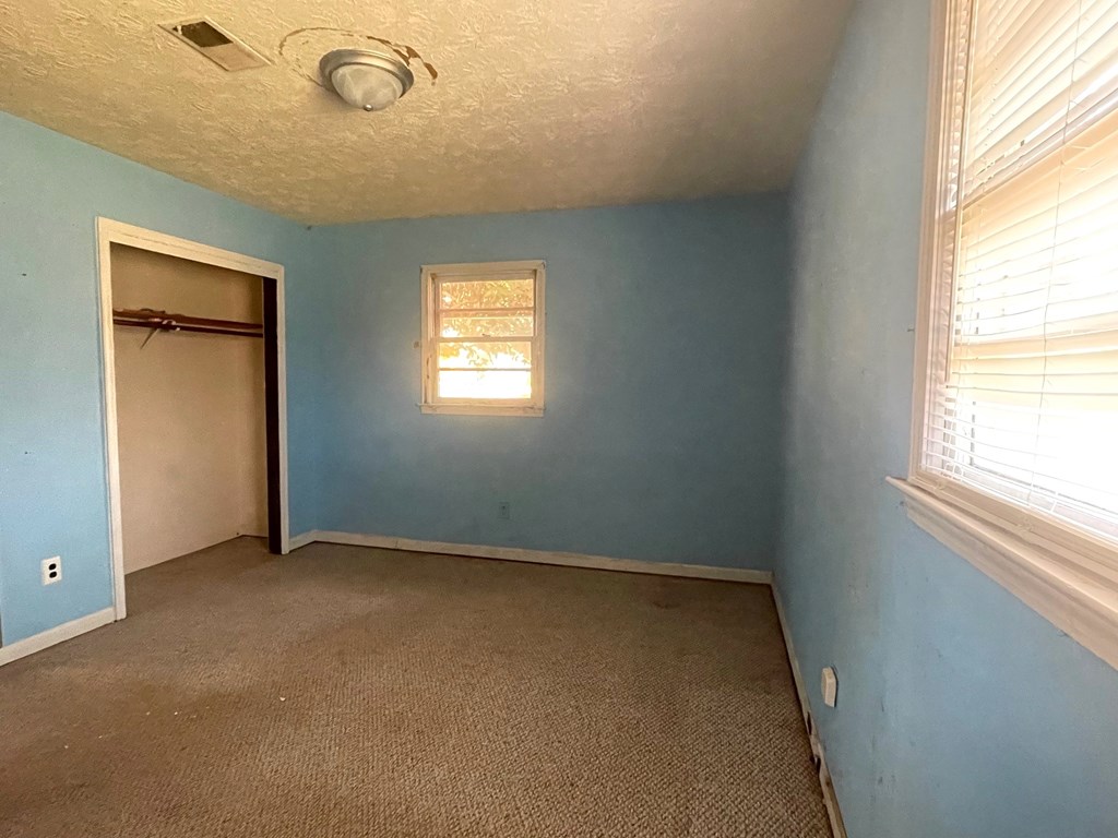1135 Casteel Road Powder Springs, GA 30127 - Photo 27 of 45 an empty room with a window