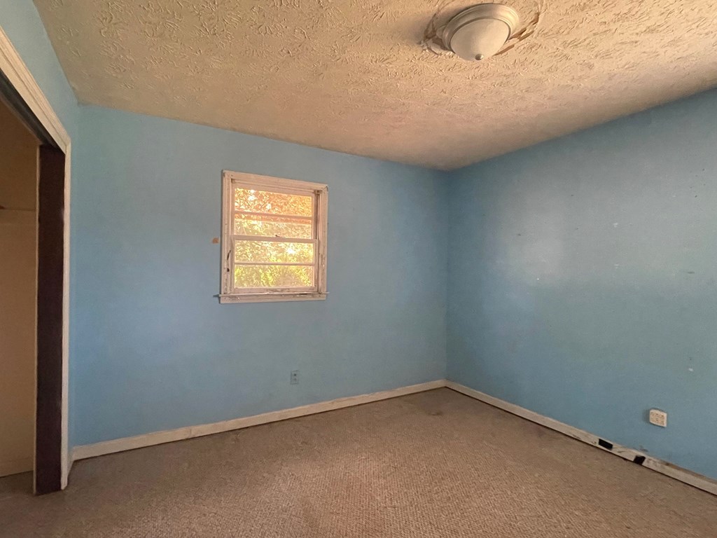1135 Casteel Road Powder Springs, GA 30127 - Photo 29 of 45 an empty room with a window