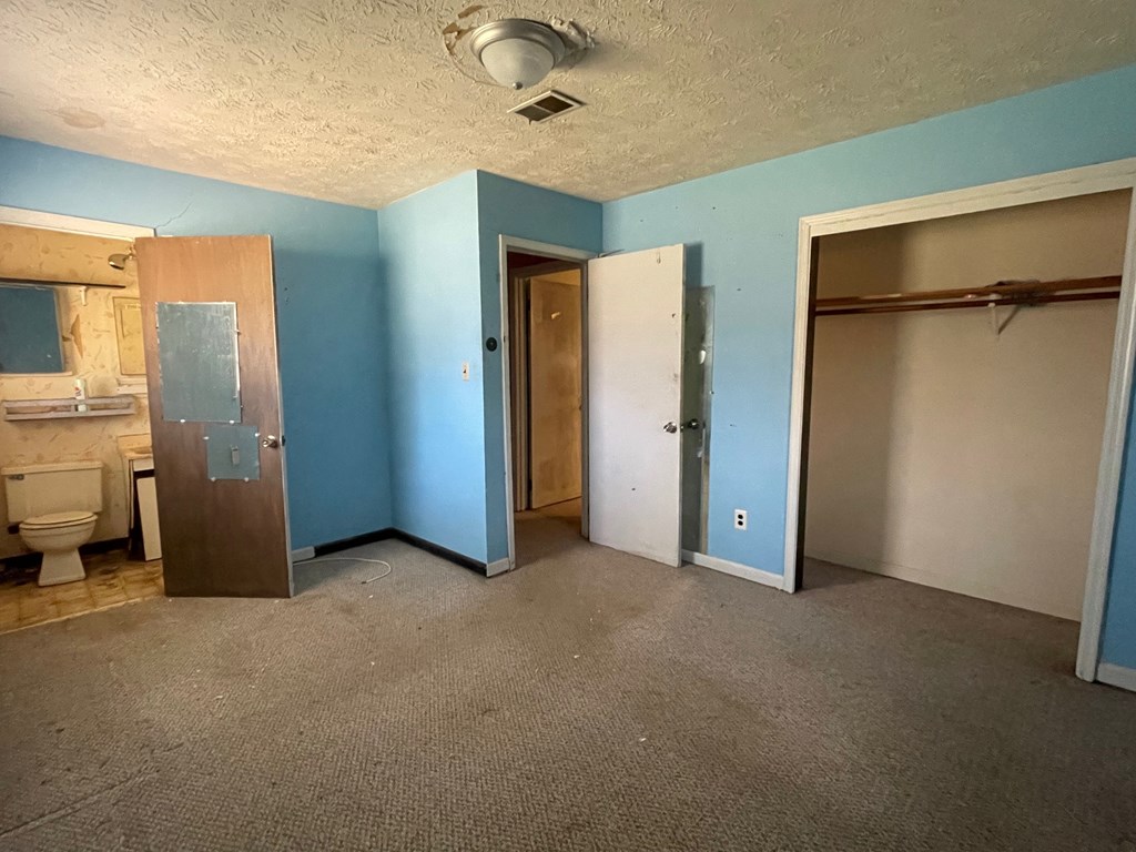 1135 Casteel Road Powder Springs, GA 30127 - Photo 30 of 45 a view of an empty room with a window