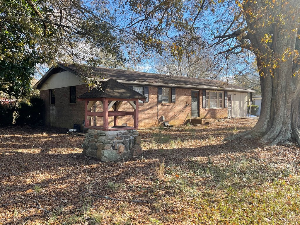 1135 Casteel Road Powder Springs, GA 30127 - Photo 3 of 45 a view of a house with a yard