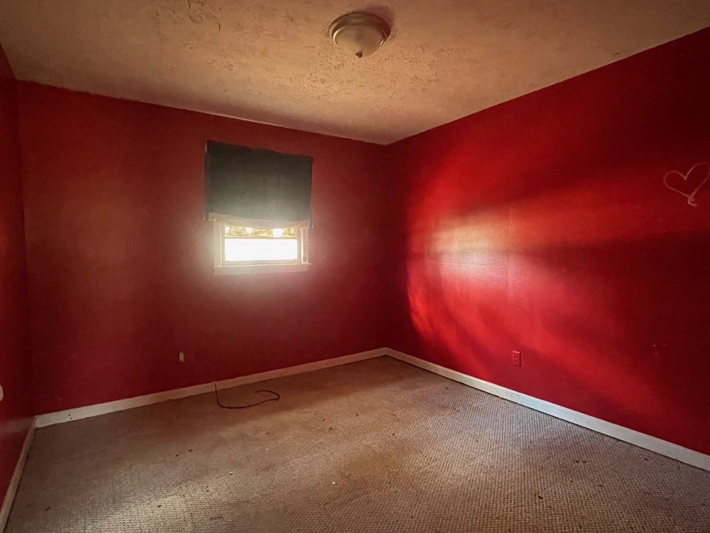 1135 Casteel Road Powder Springs, GA 30127 - Photo 35 of 45 an empty room with a empty space and windows