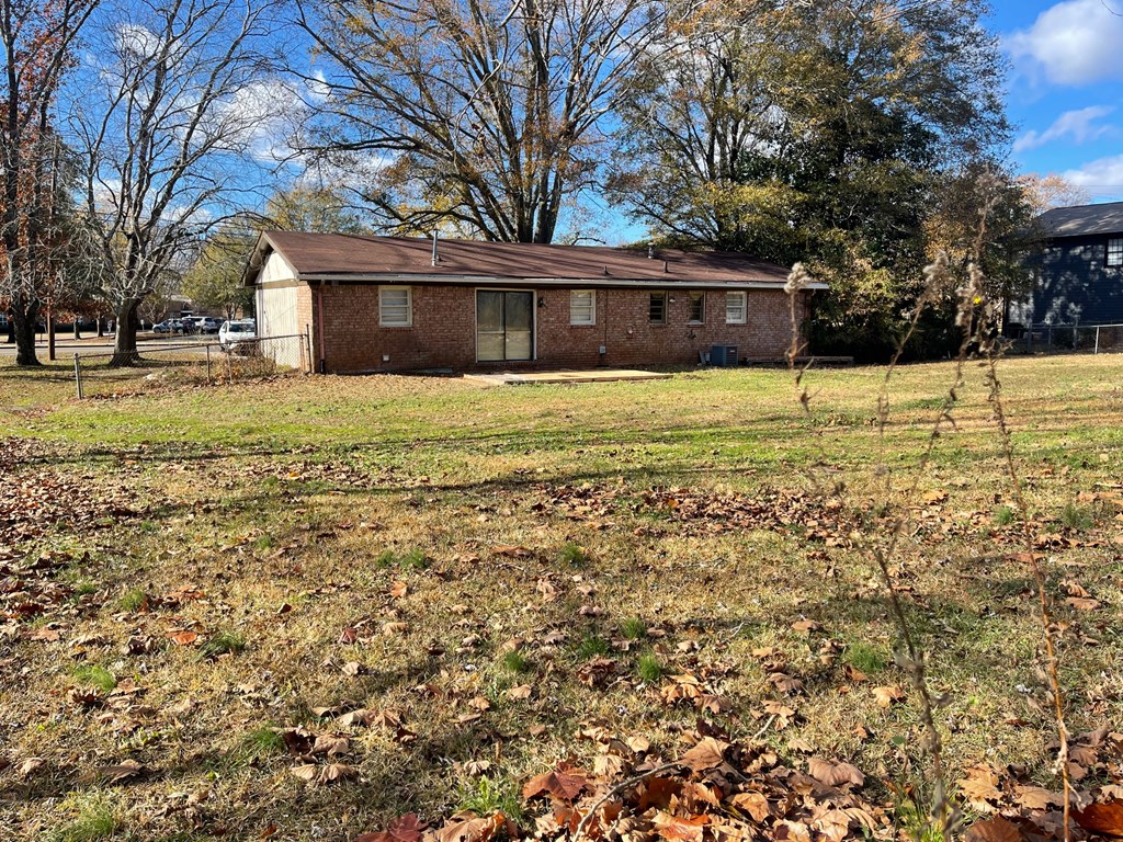 1135 Casteel Road Powder Springs, GA 30127 - Photo 45 of 45 a front view of a house with a yard