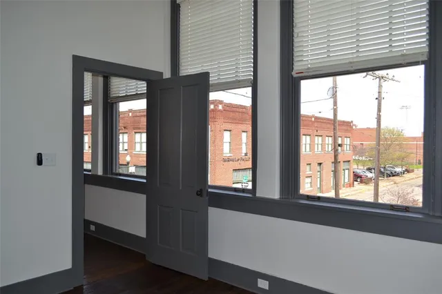 a view of an empty room and window