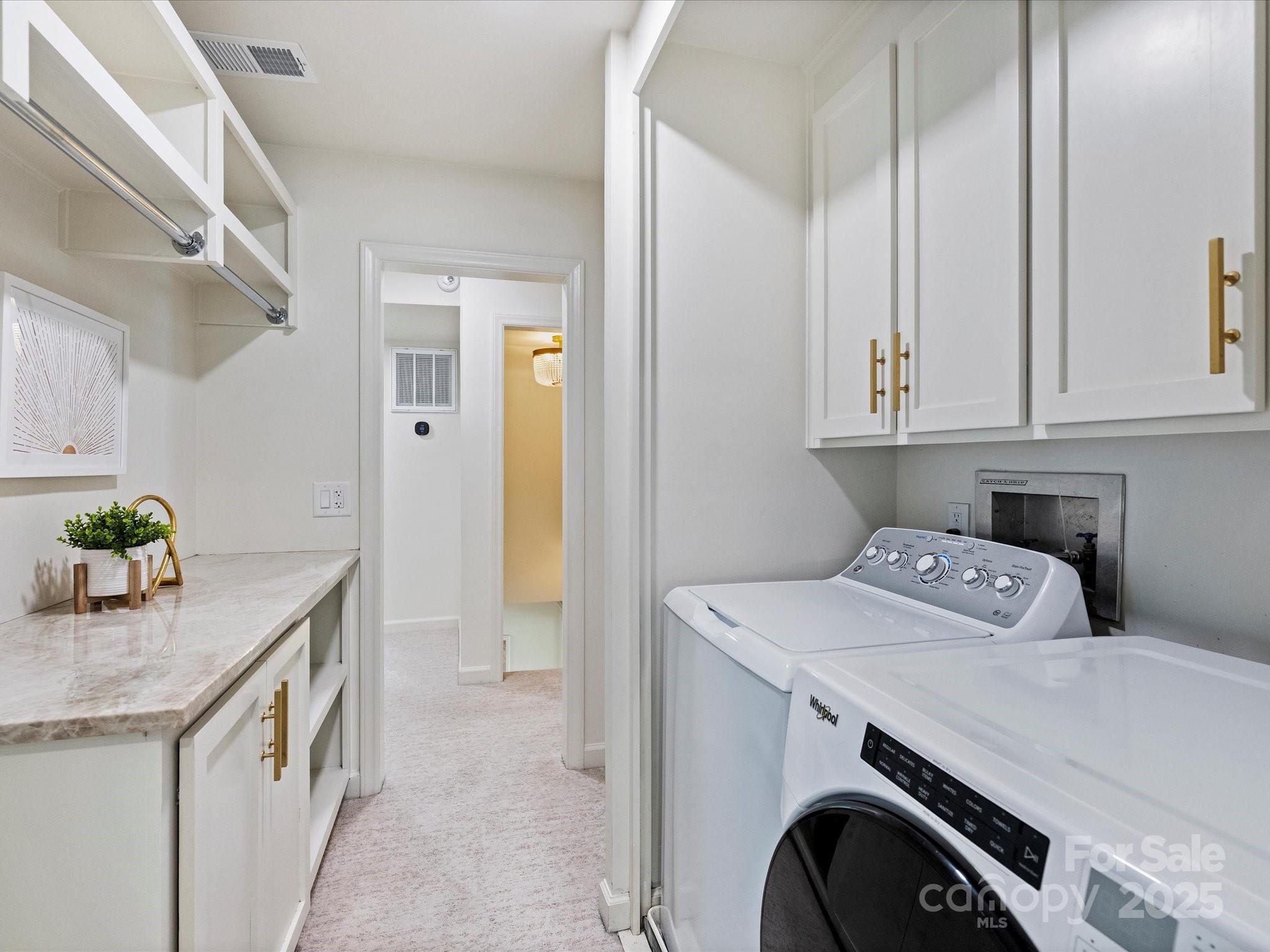 2919 Wickersham Road Charlotte, NC 28211 - Photo 24 of 30 a utility room with dryer and washer