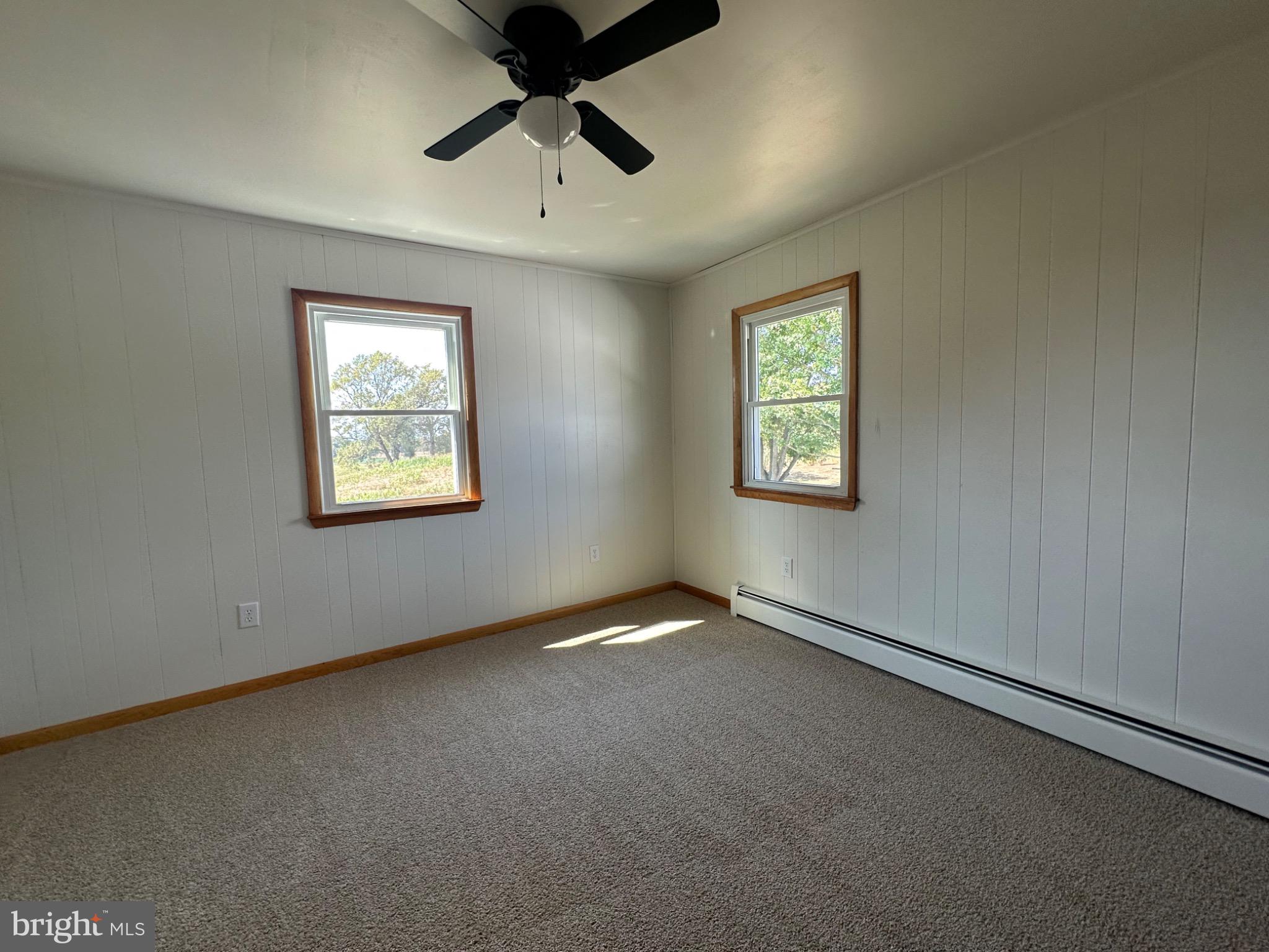 1825 White Hall Road Littlestown, PA 17340 - Photo 13 of 89 an empty room with windows and fan