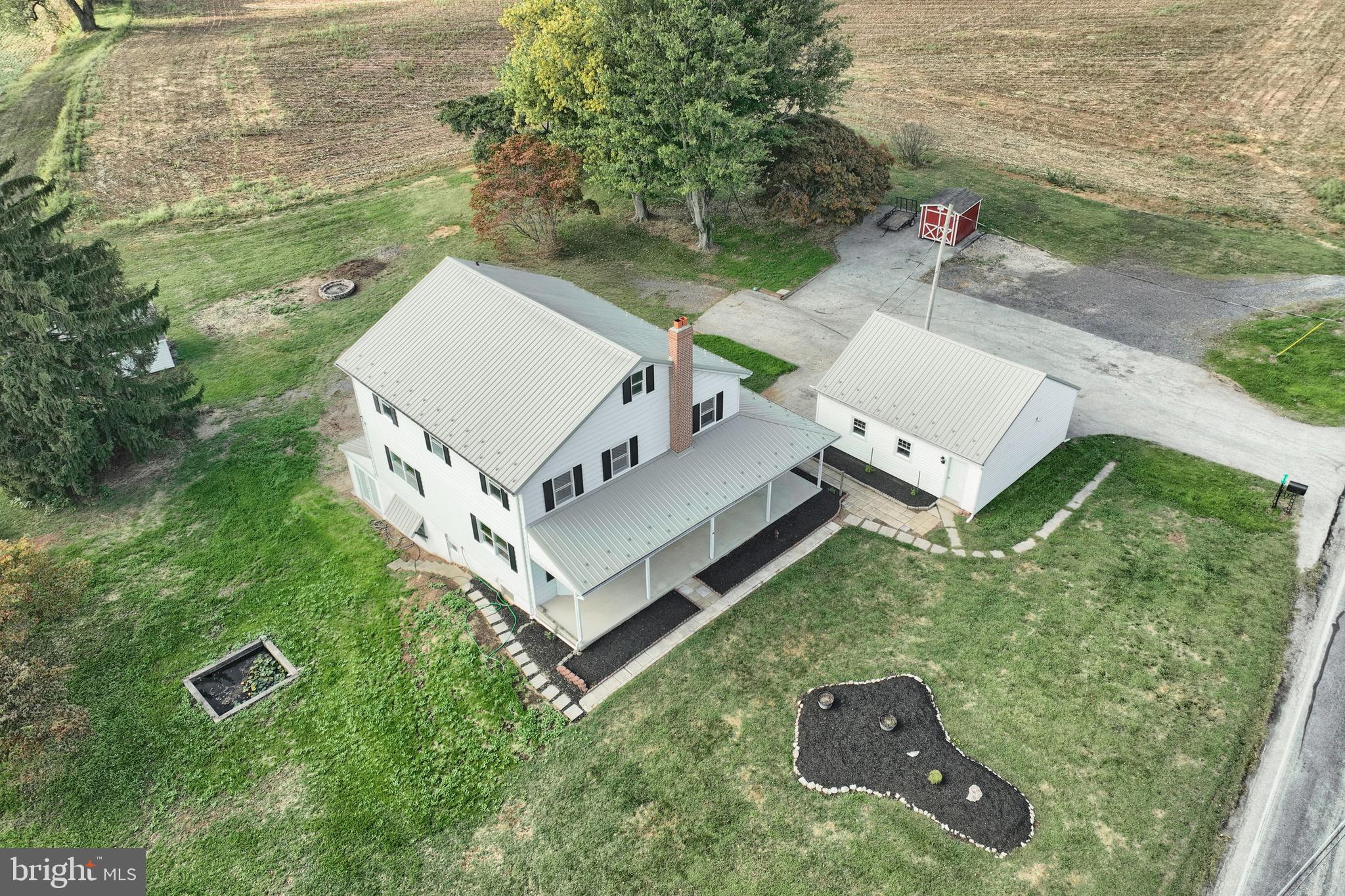 1825 White Hall Road Littlestown, PA 17340 - Photo 20 of 89 an aerial view of residential house with outdoor space and trees