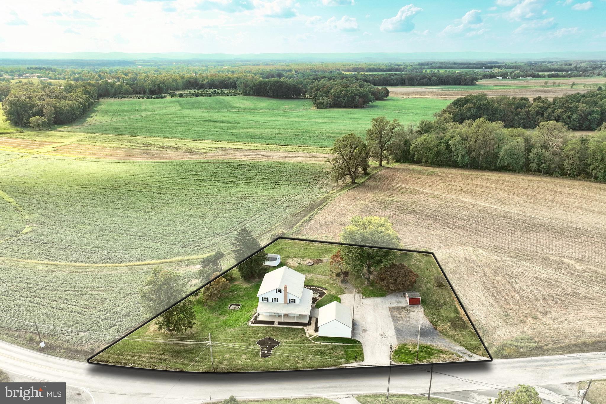 1825 White Hall Road Littlestown, PA 17340 - Photo 2 of 89 a view of a swimming pool with a yard