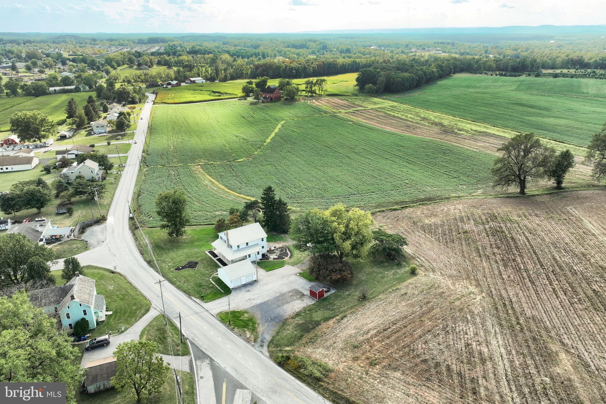 1825 White Hall Road Littlestown, PA 17340 - Photo 24 of 89 an aerial view of a house having yard