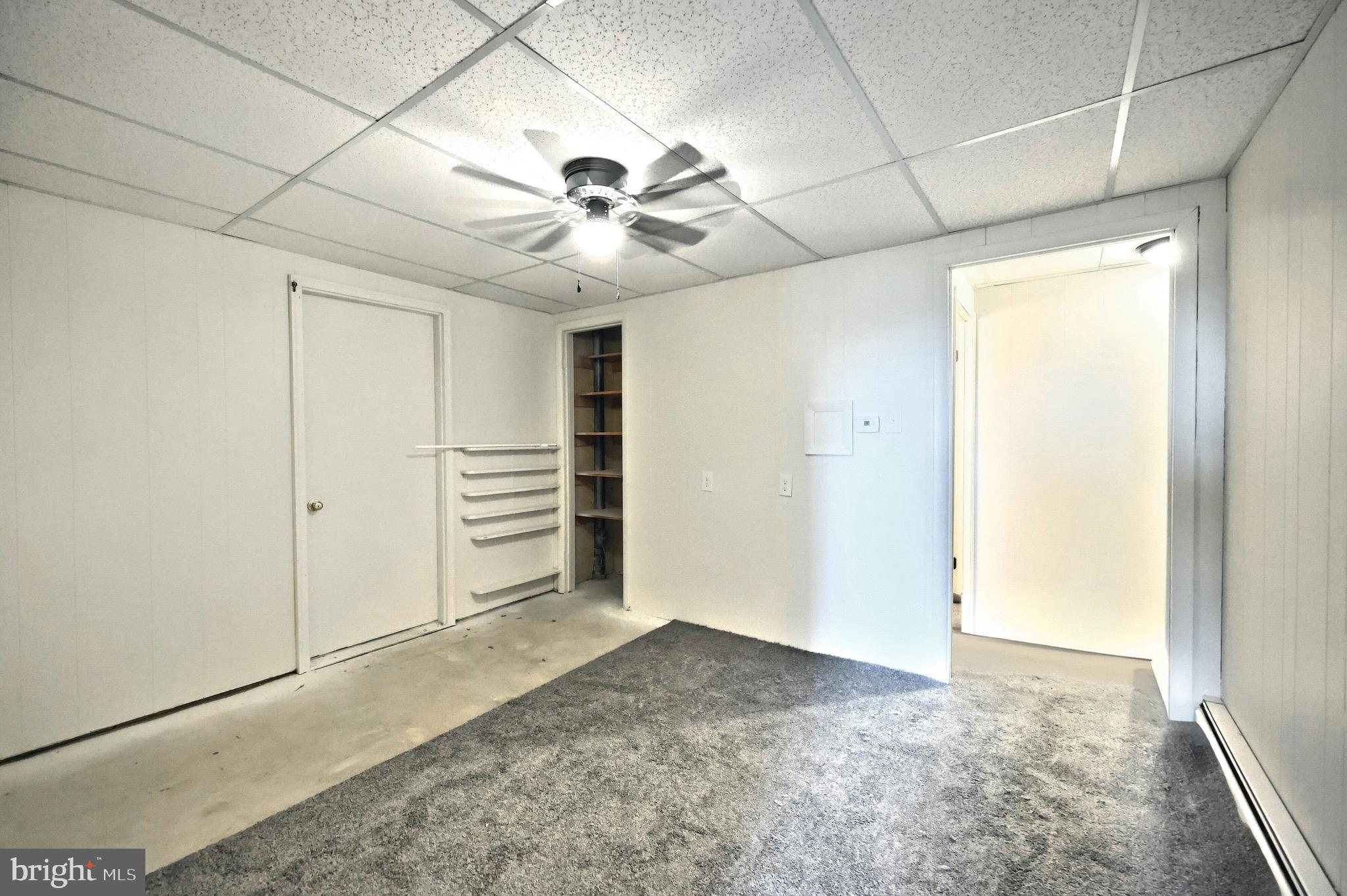 1825 White Hall Road Littlestown, PA 17340 - Photo 26 of 89 a view of a livingroom with a ceiling fan and window