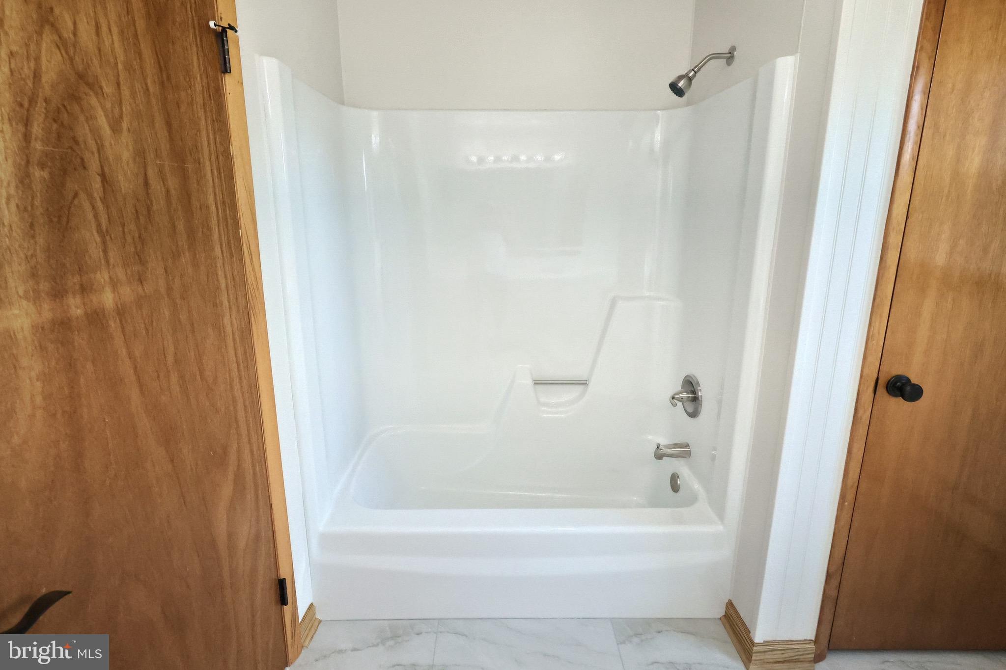 1825 White Hall Road Littlestown, PA 17340 - Photo 35 of 89 a bathroom with a bathtub and a shower