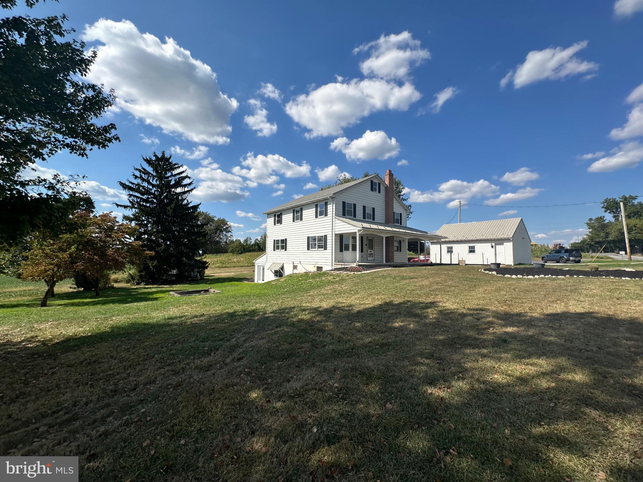 1825 White Hall Road Littlestown, PA 17340 - Photo 4 of 89 Charming home under a bright blue sky.