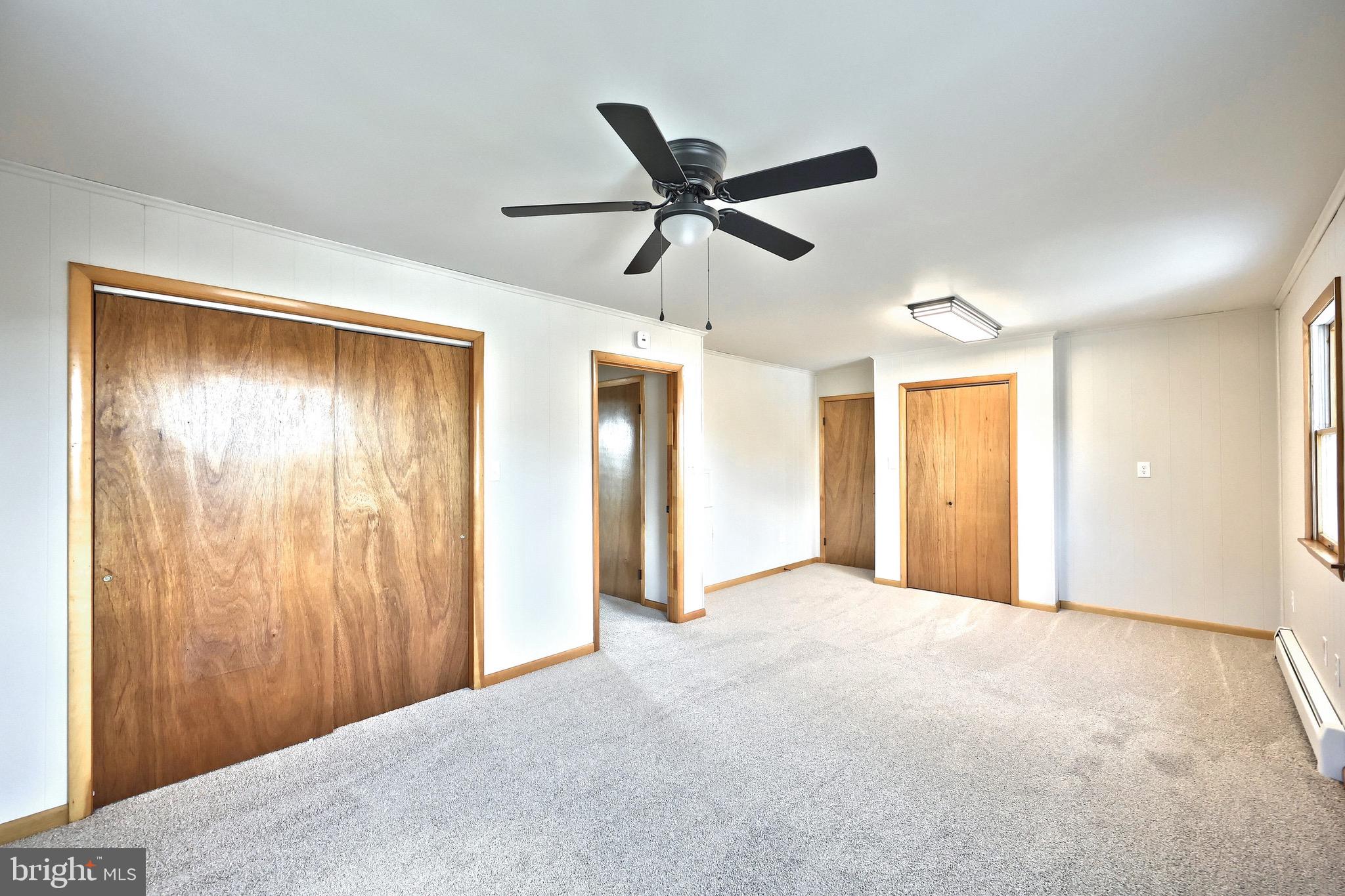 1825 White Hall Road Littlestown, PA 17340 - Photo 45 of 89 a view of a livingroom with a ceiling fan and window