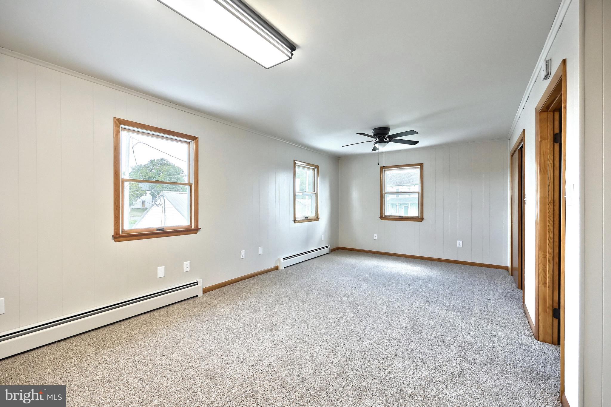 1825 White Hall Road Littlestown, PA 17340 - Photo 46 of 89 an empty room with a window and fireplace