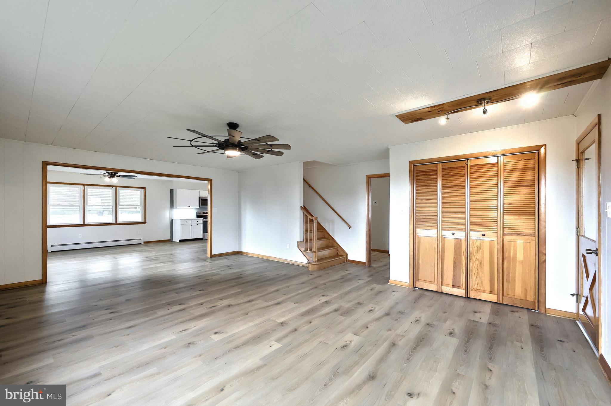 1825 White Hall Road Littlestown, PA 17340 - Photo 53 of 89 wooden floor in an empty room with a window