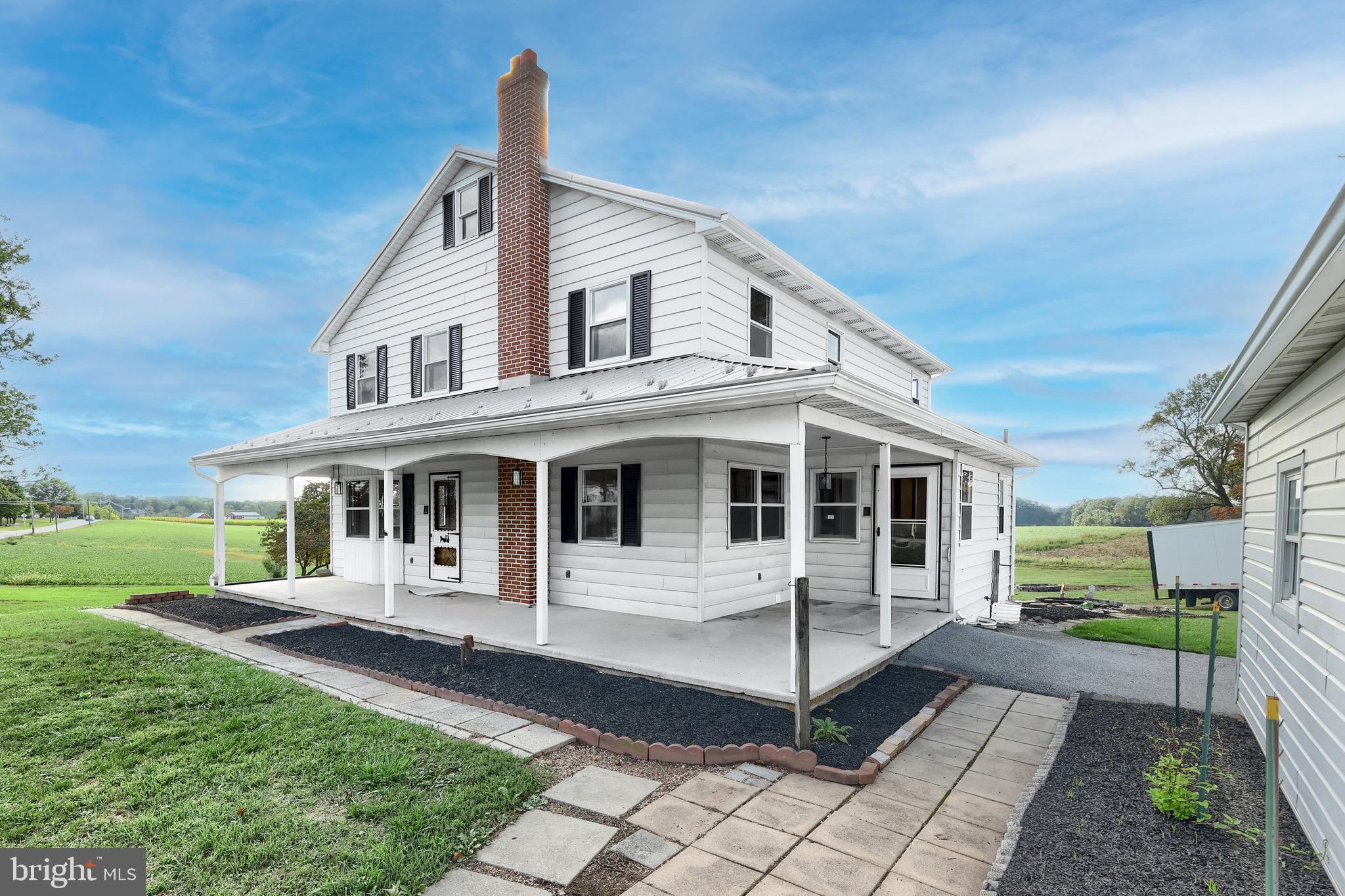 1825 White Hall Road Littlestown, PA 17340 - Photo 67 of 89 a front view of a house with a yard