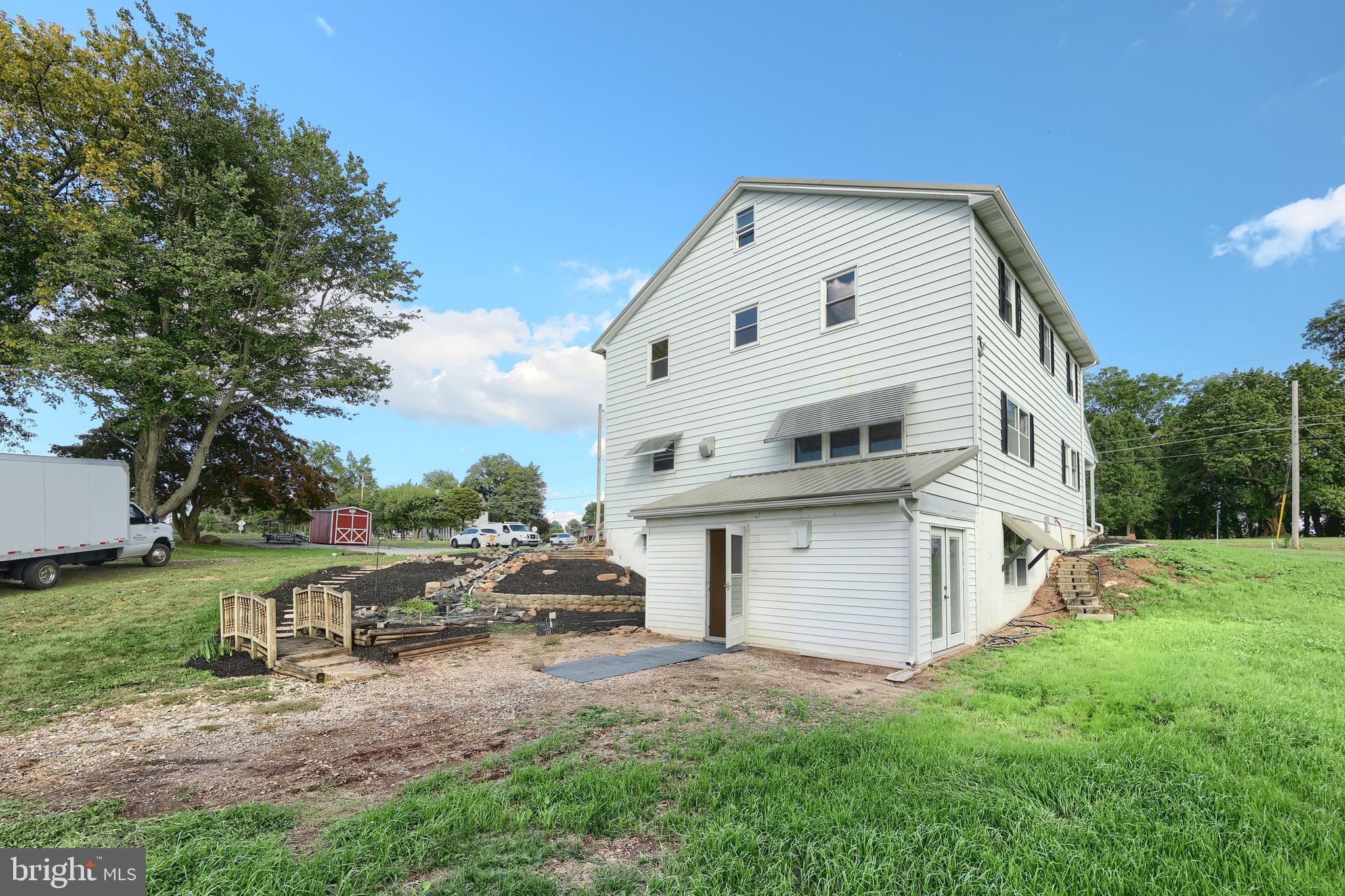 1825 White Hall Road Littlestown, PA 17340 - Photo 70 of 89 a front view of a house with a yard