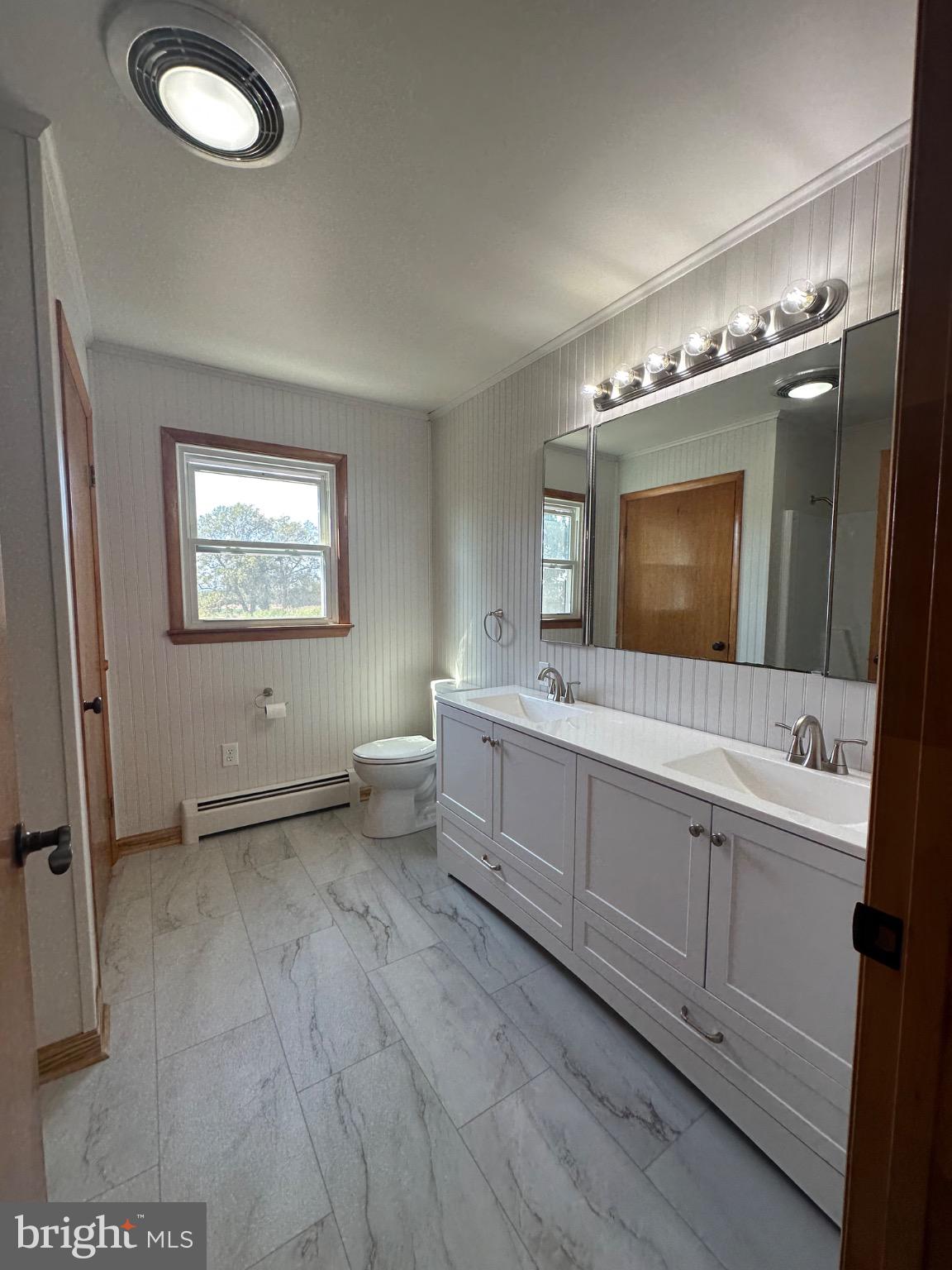 1825 White Hall Road Littlestown, PA 17340 - Photo 7 of 89 a bathroom with a double vanity sink mirror and bathtub
