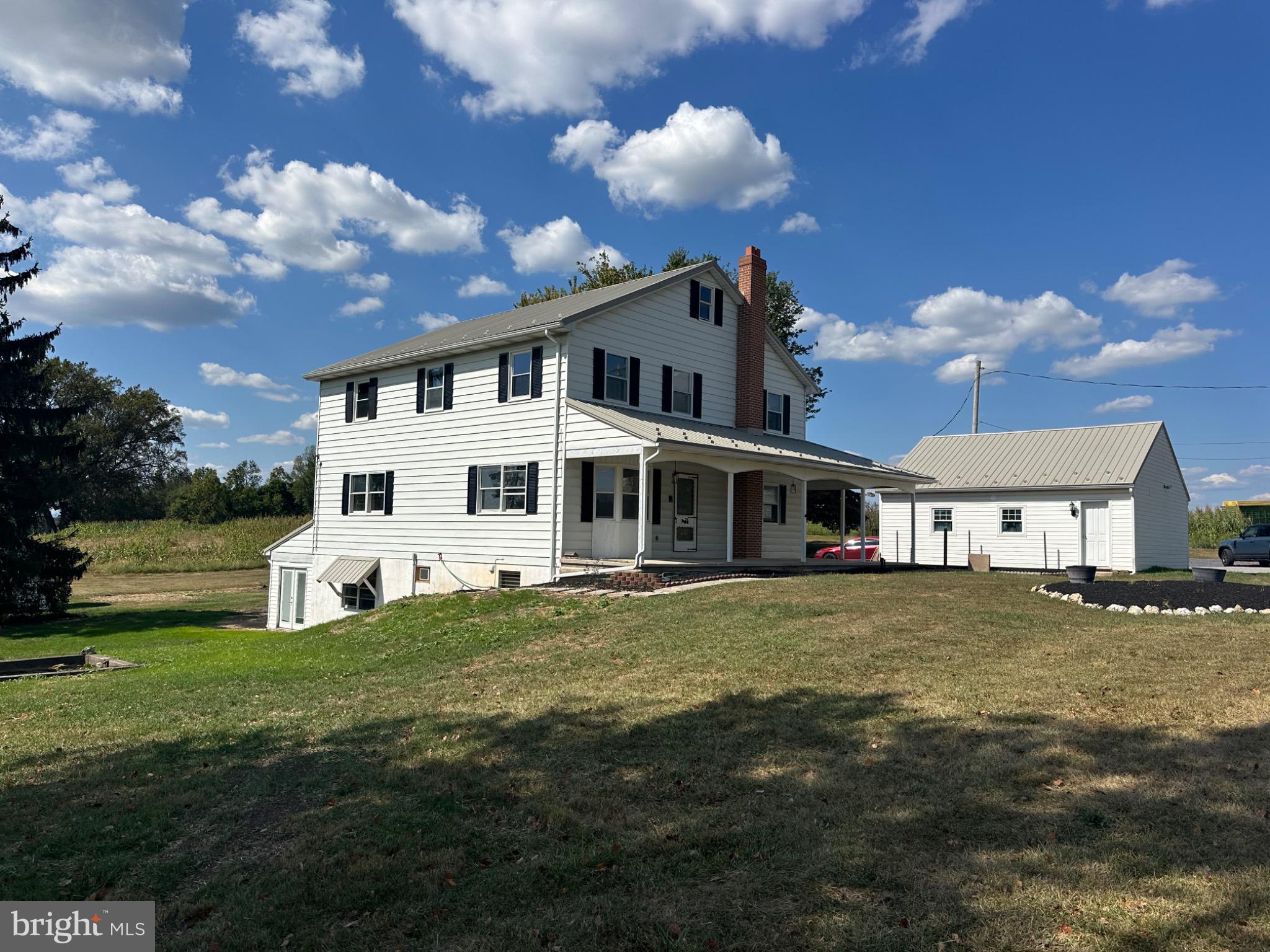 1825 White Hall Road Littlestown, PA 17340 - Photo 80 of 89 a front view of a house with a garden